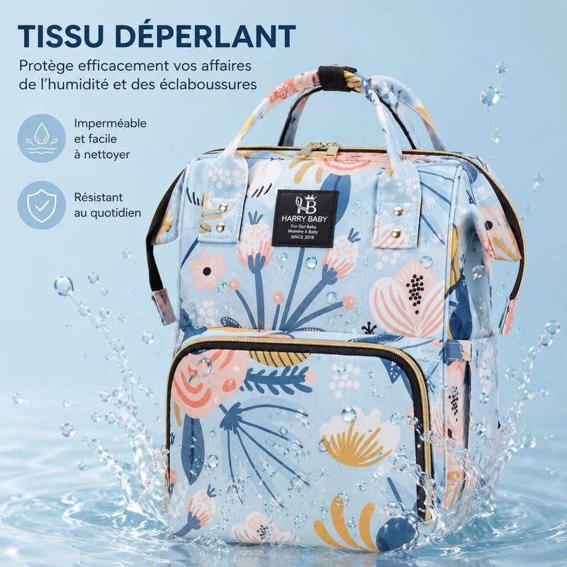 Sac à dos à langer bébé bleu fleuri en tissu déperlant résistant aux éclaboussures