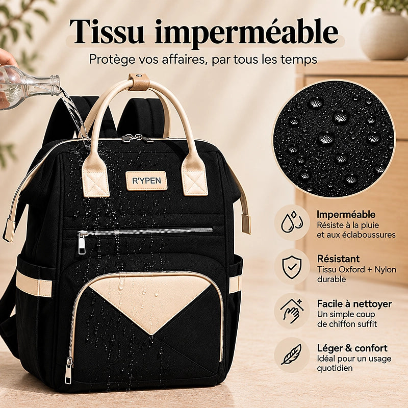 Sac à dos à langer noir imperméable, démonstration résistance à l'eau
