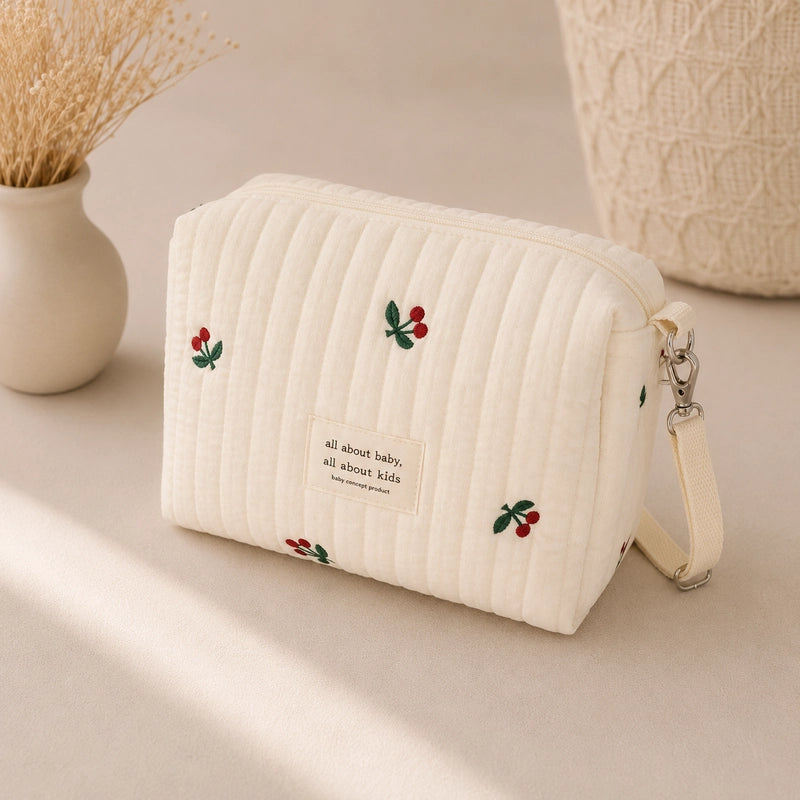 Trousse de toilette bébé matelassée écrue brodée cerises, avec dragonne amovible